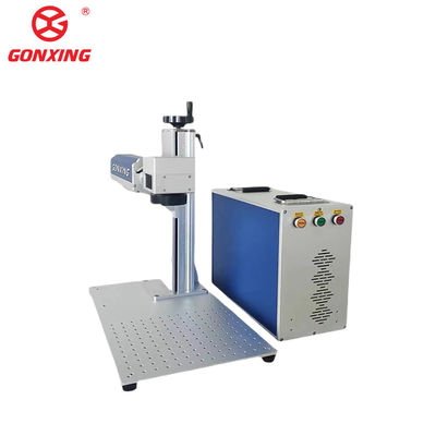 Les magasins de vêtements bénéficient d'une machine d'impression laser à table en fibre 3D 2D avec une capacité de refroidissement à l'eau de 10 à 100%